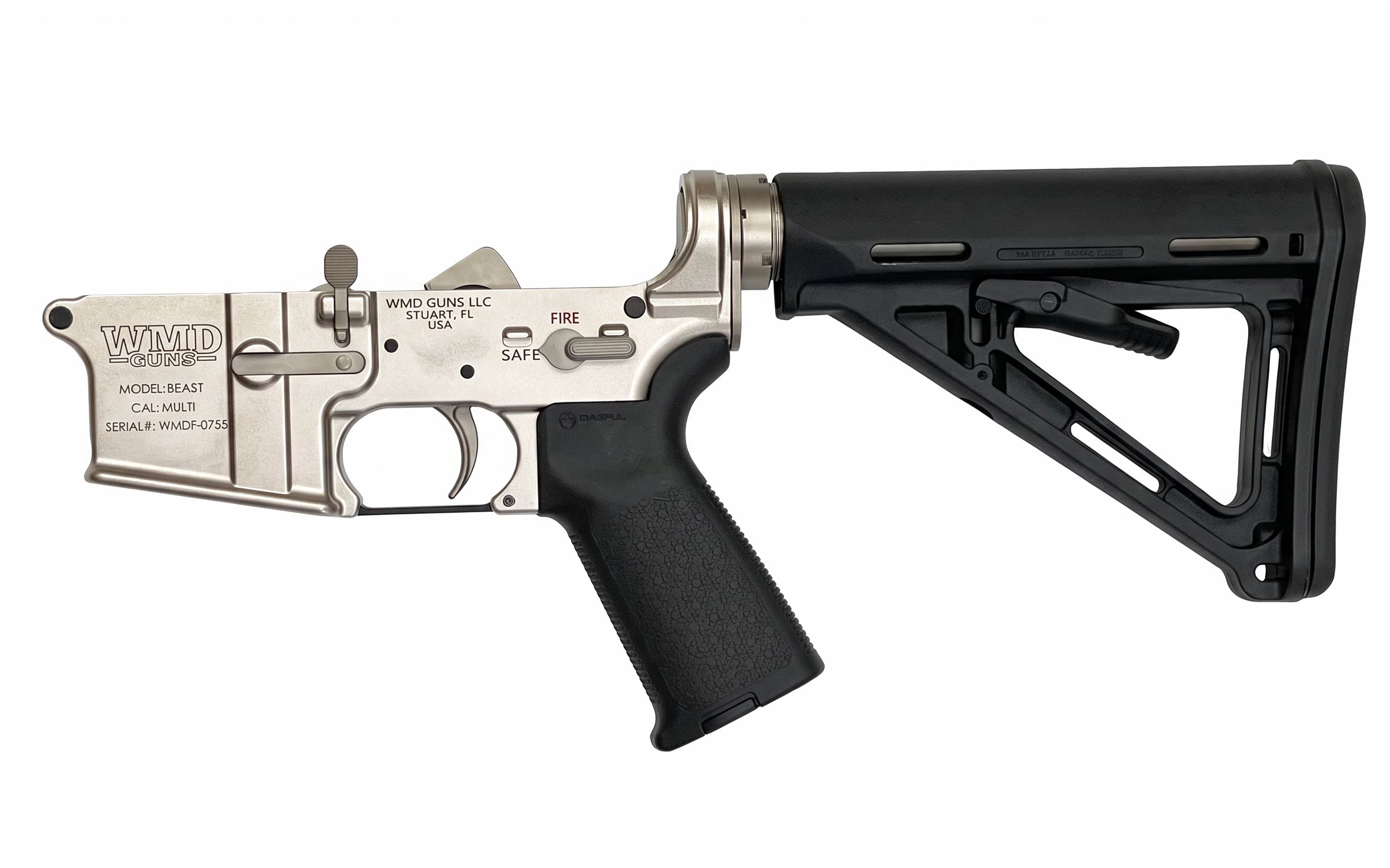 A silver and black AR-15 lower receiver and adjustable stock, with the safety selector visible, engraved text, and a black pistol grip, photographed on a white background.