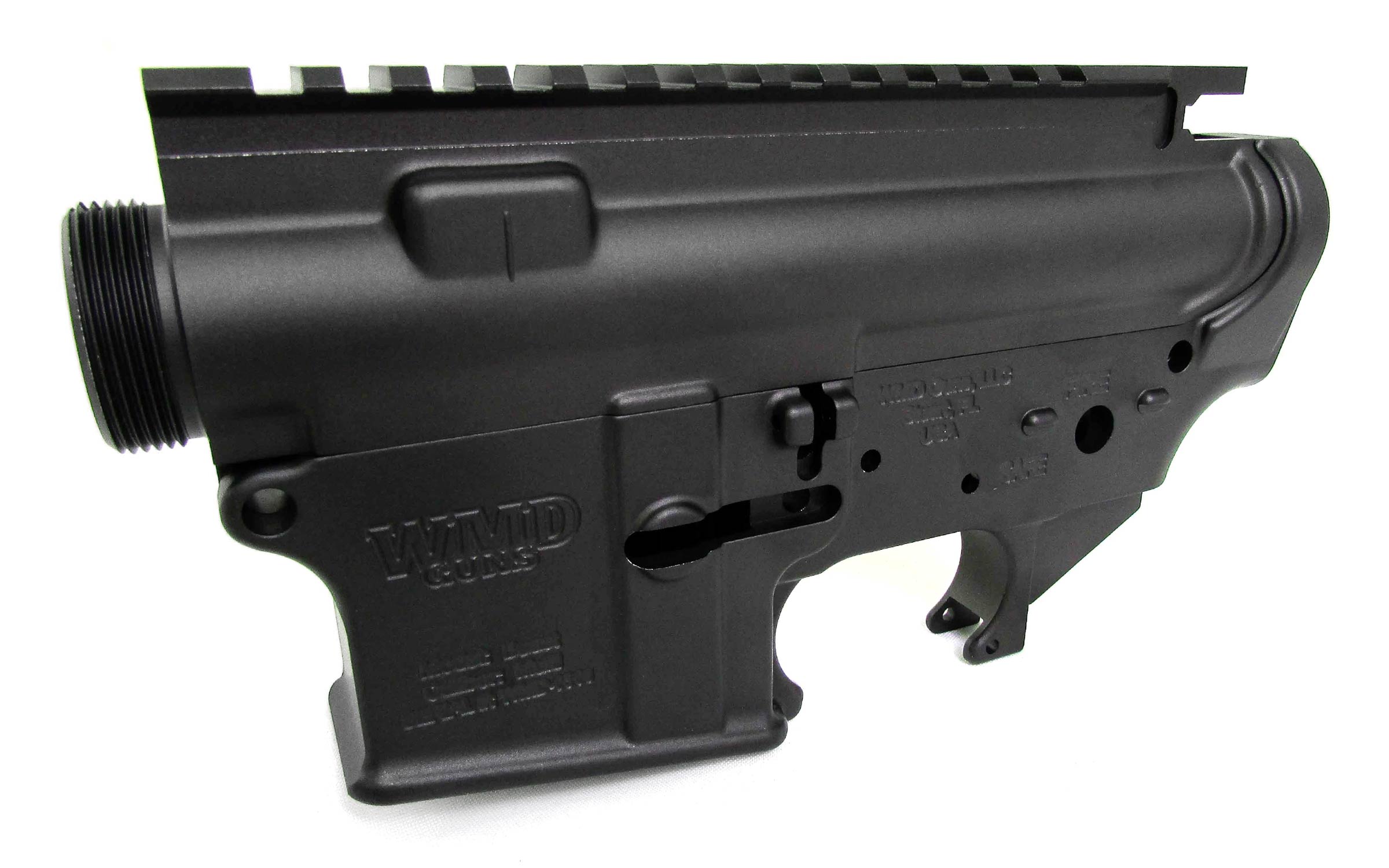 A black AR-15 stripped lower and upper receiver set, featuring various cutouts, engravings, and attachment points for firearm assembly.