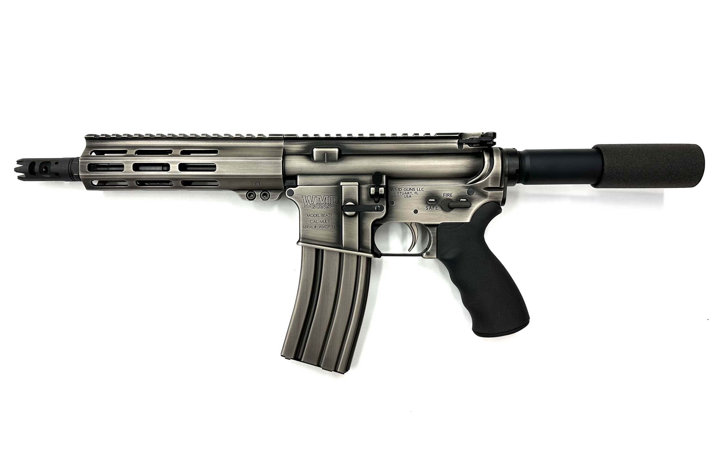 A compact, metallic semi-automatic rifle with a short barrel, black grip, and adjustable stock, displayed on a white background.