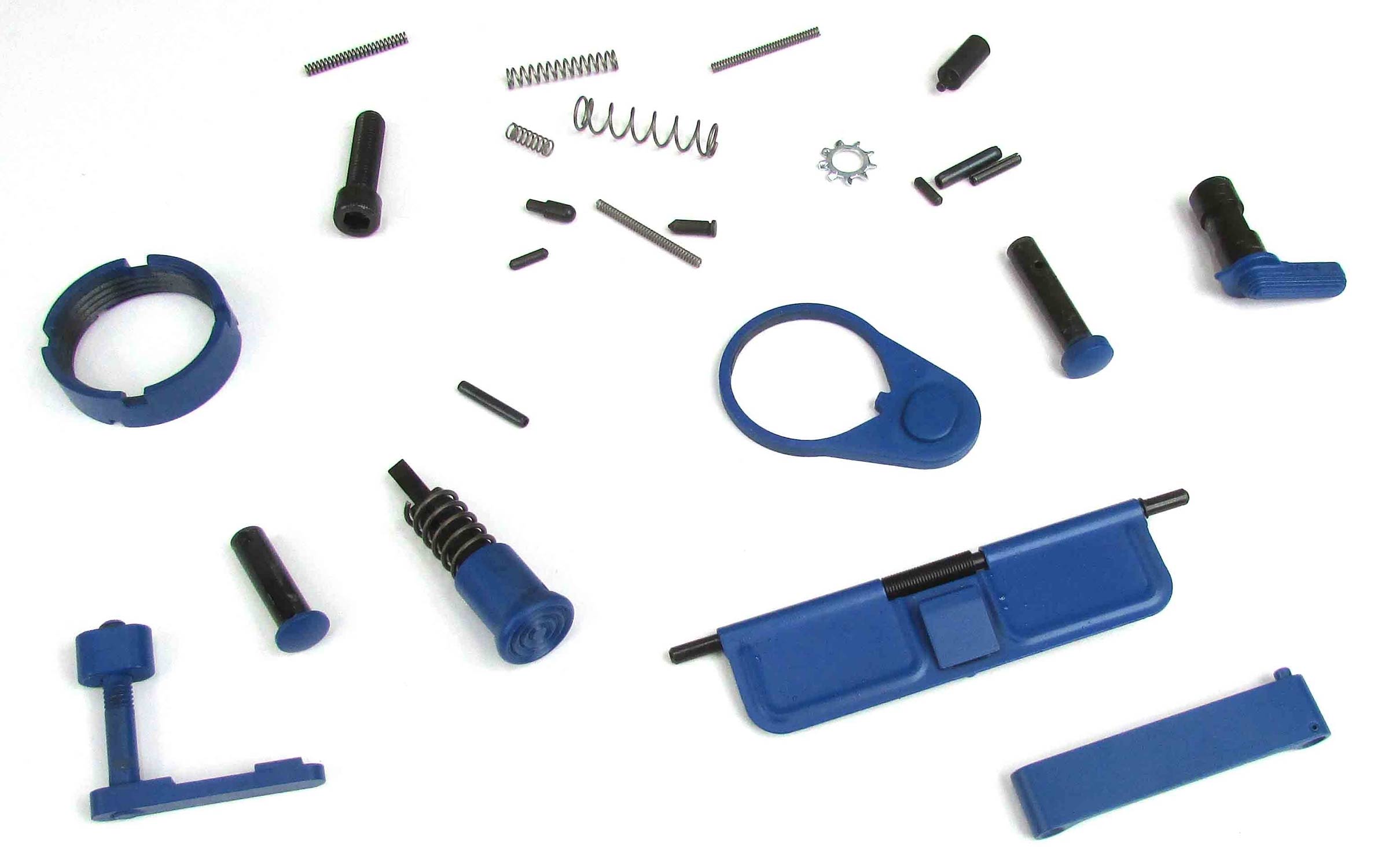 Assorted small blue and black gun parts and springs are laid out on a white background, with pieces of varying shapes and sizes, including pins, levers, and covers.