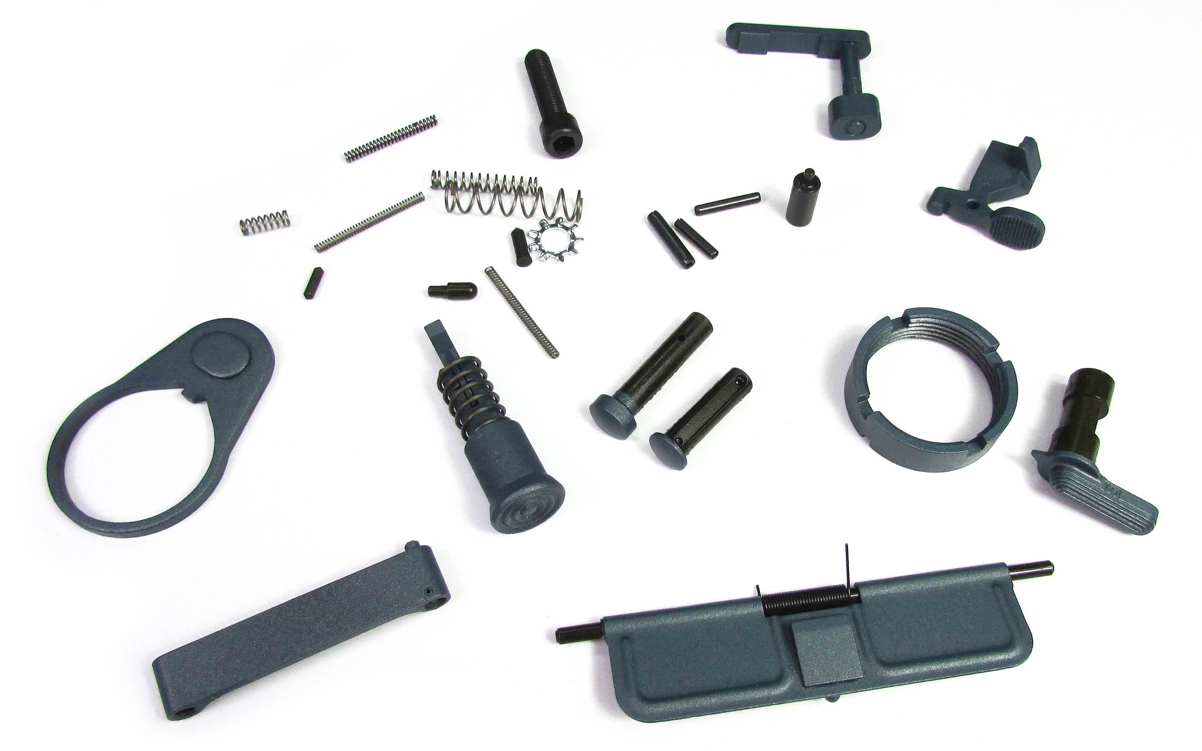 Assorted small black metal gun parts including springs, pins, levers, and covers, arranged on a white background.