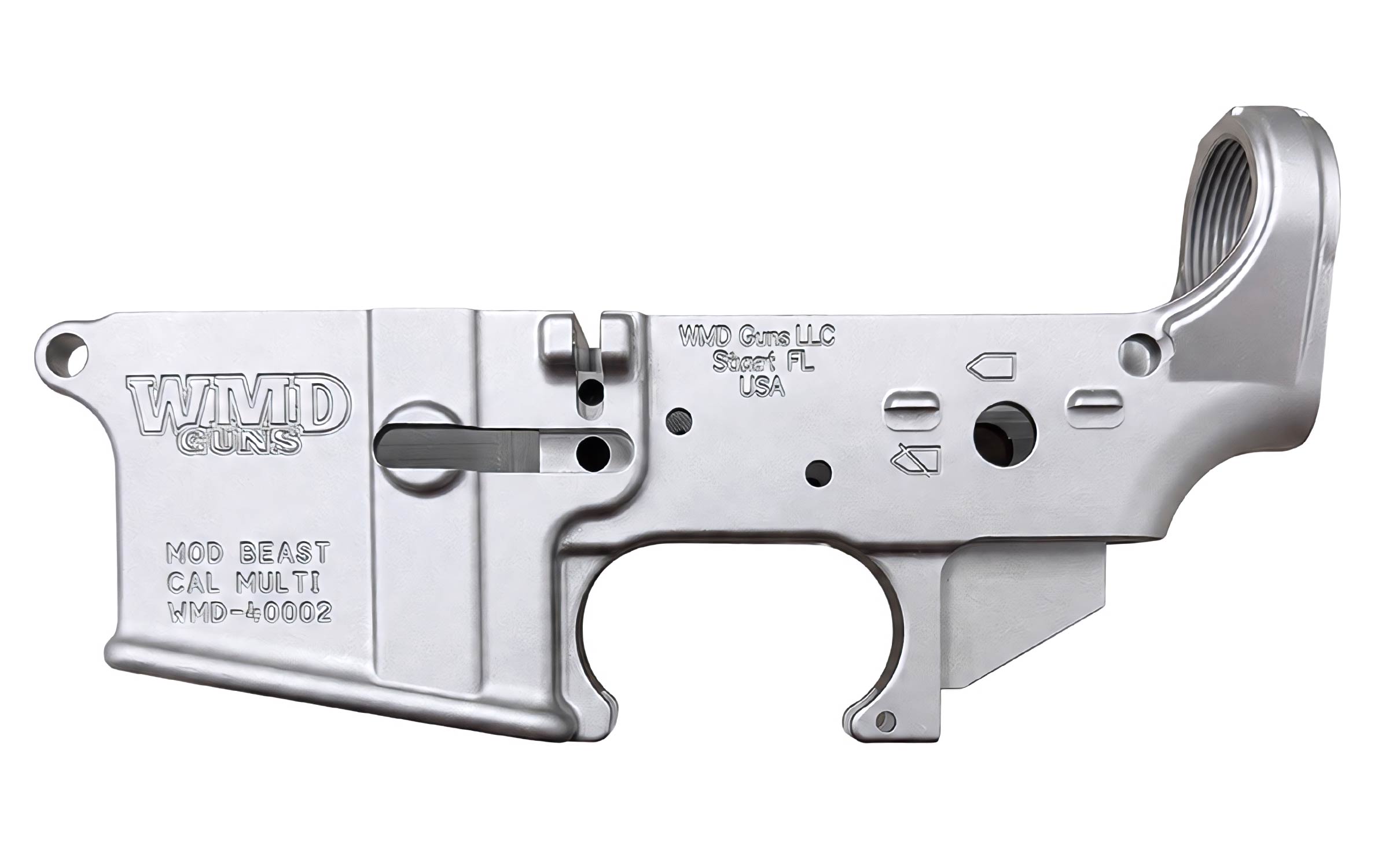 Silver-colored AR-15 stripped lower receiver with WMD Guns branding and markings.